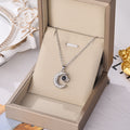 Silver moon charm pendant necklace with rhinestone crescent on chain
