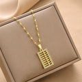 Gold-tone mini abacus charm necklace with rectangular crystal-studded pendant