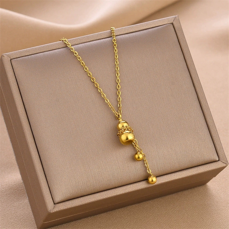Gold mini gourd charm pendant necklace with long chain and small dangling bead charms