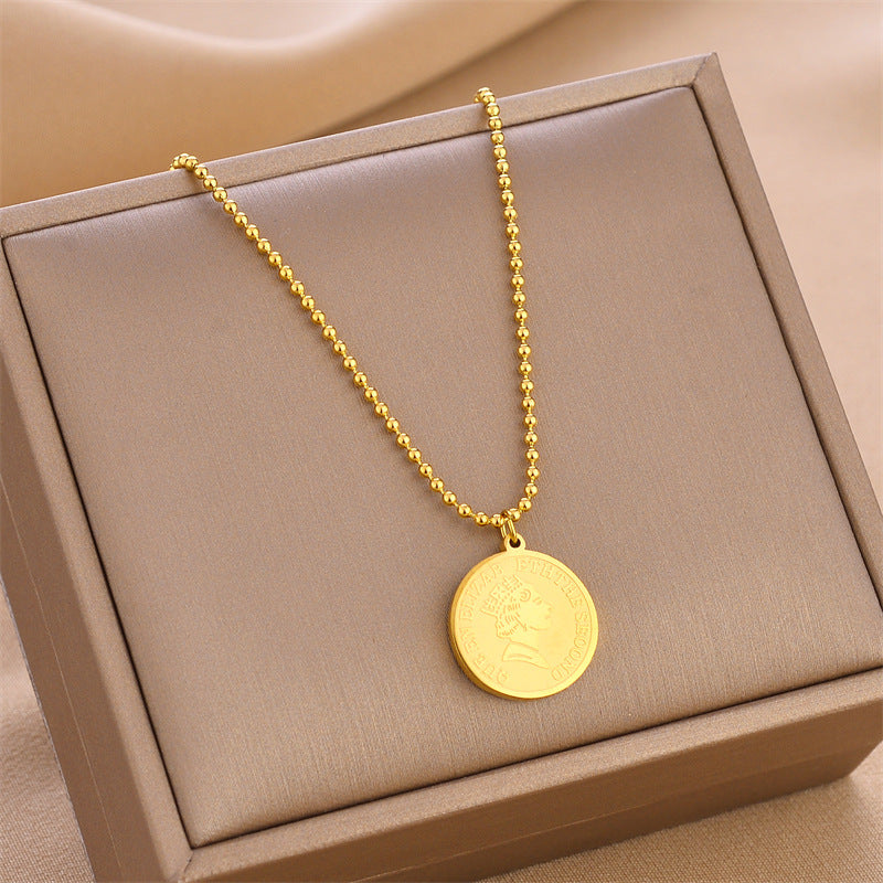 Gold coin charm pendant necklace with beaded chain, round medallion pendant
