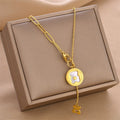 Gold bear disc charm pendant necklace with link chain and dangling small bear charm