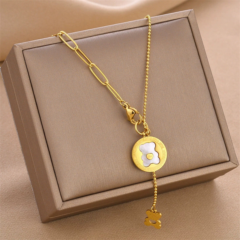 Gold bear disc charm pendant necklace with link chain and dangling small bear charm