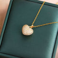 Gold necklace with a pavé heart charm