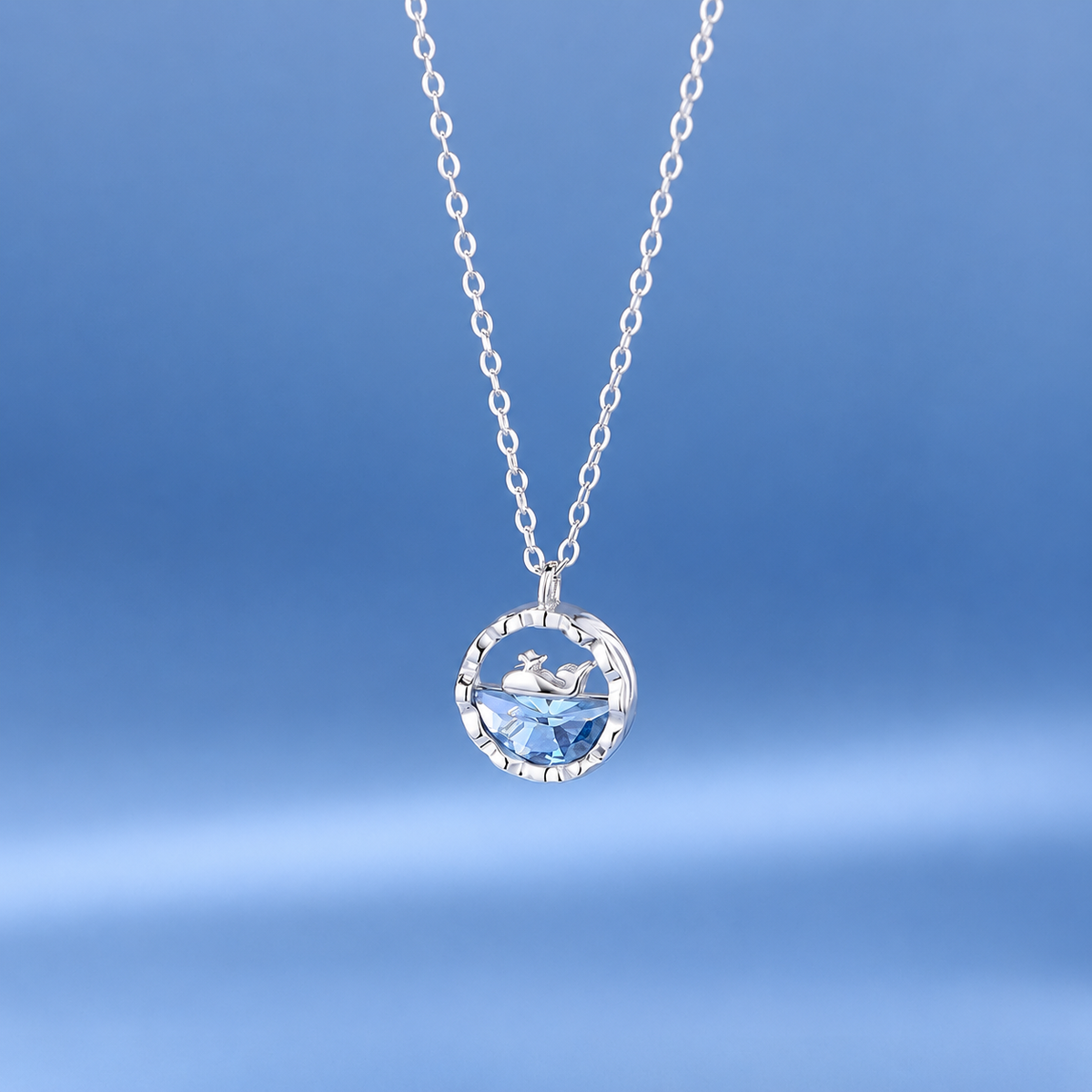 Silver mini shark ocean pendant necklace with small round blue crystal and shark charm