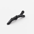 Black duckbill hair sectioning clip with comb grip tab