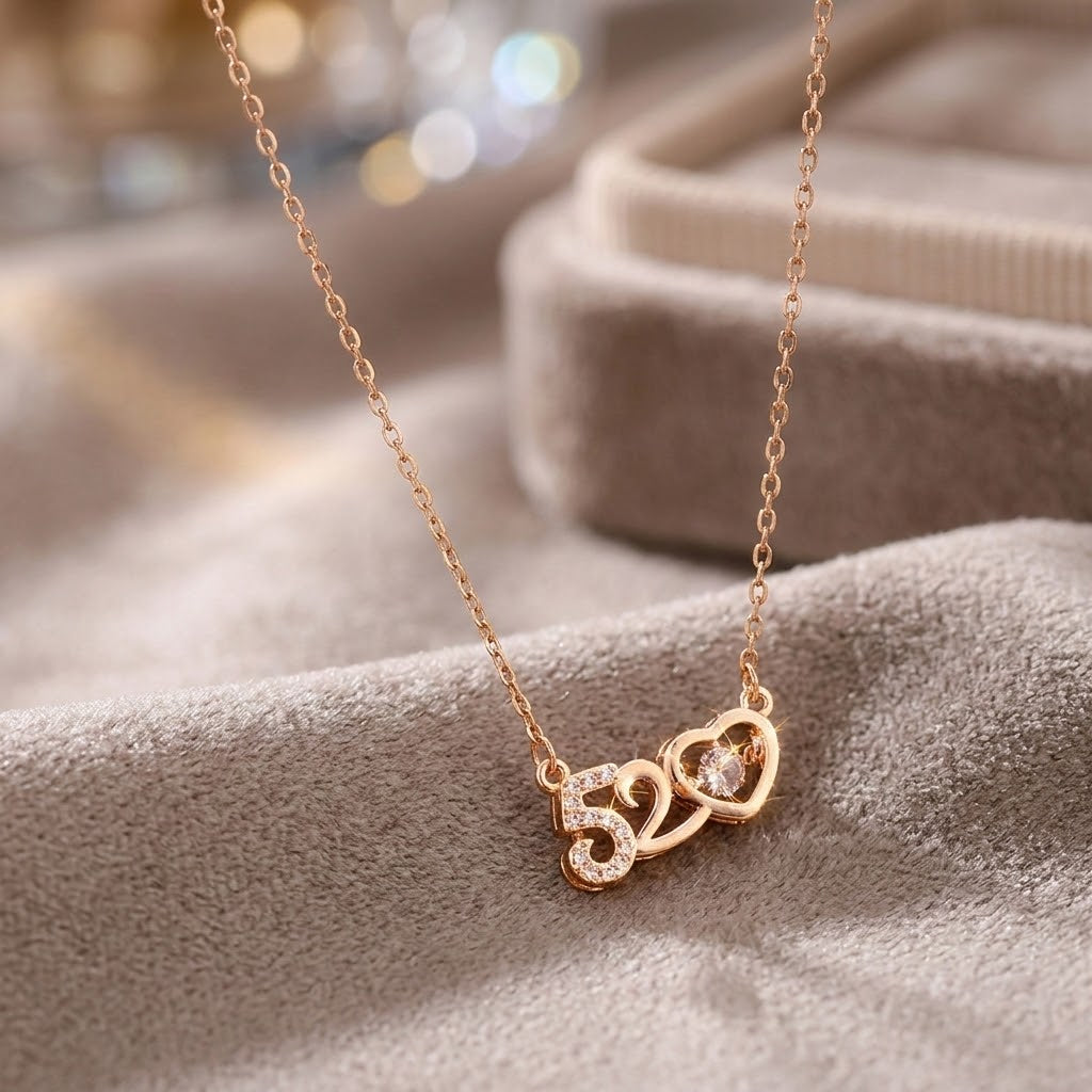 Rose gold-tone '520' heart charm necklace on a delicate chain