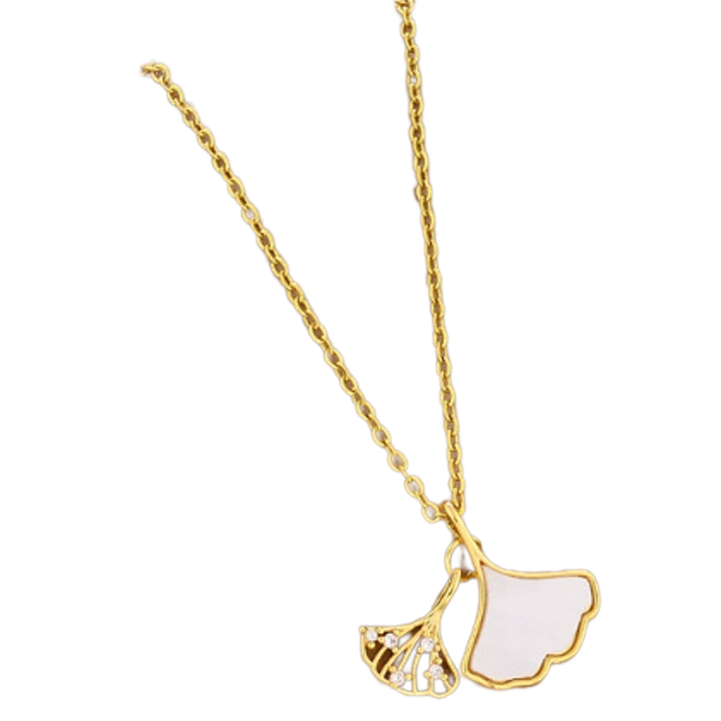 Gold-tone ginkgo leaf pendant necklace, close-up with white enamel leaf and rhinestone detail