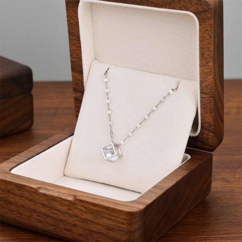 Square frame charm necklace with silver-toned chain and square crystal pendant