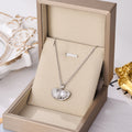 Silver shell charm necklace with pearl pendant on fine chain