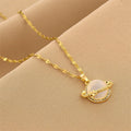Gold-tone star globe charm necklace with white globe pendant and star accent
