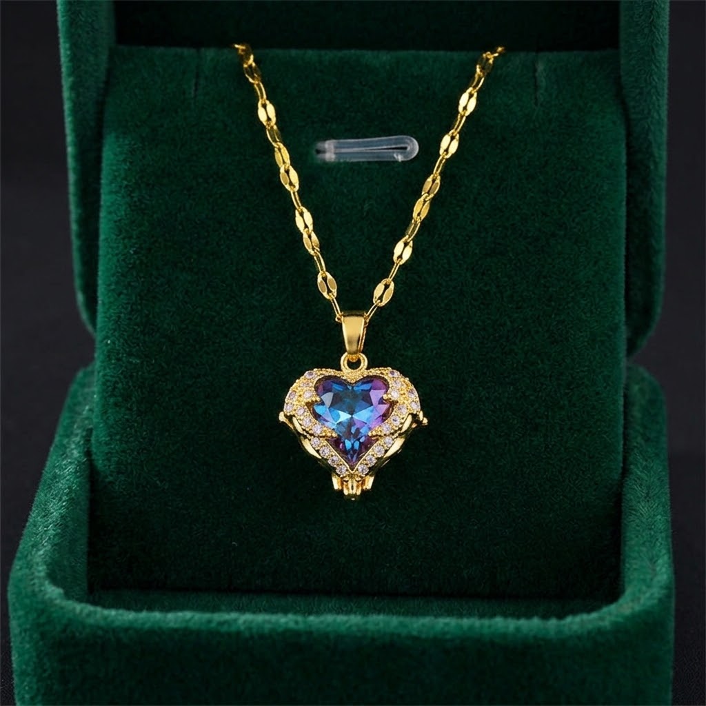 Gold heart halo pendant necklace with purple center gemstone and crystal frame