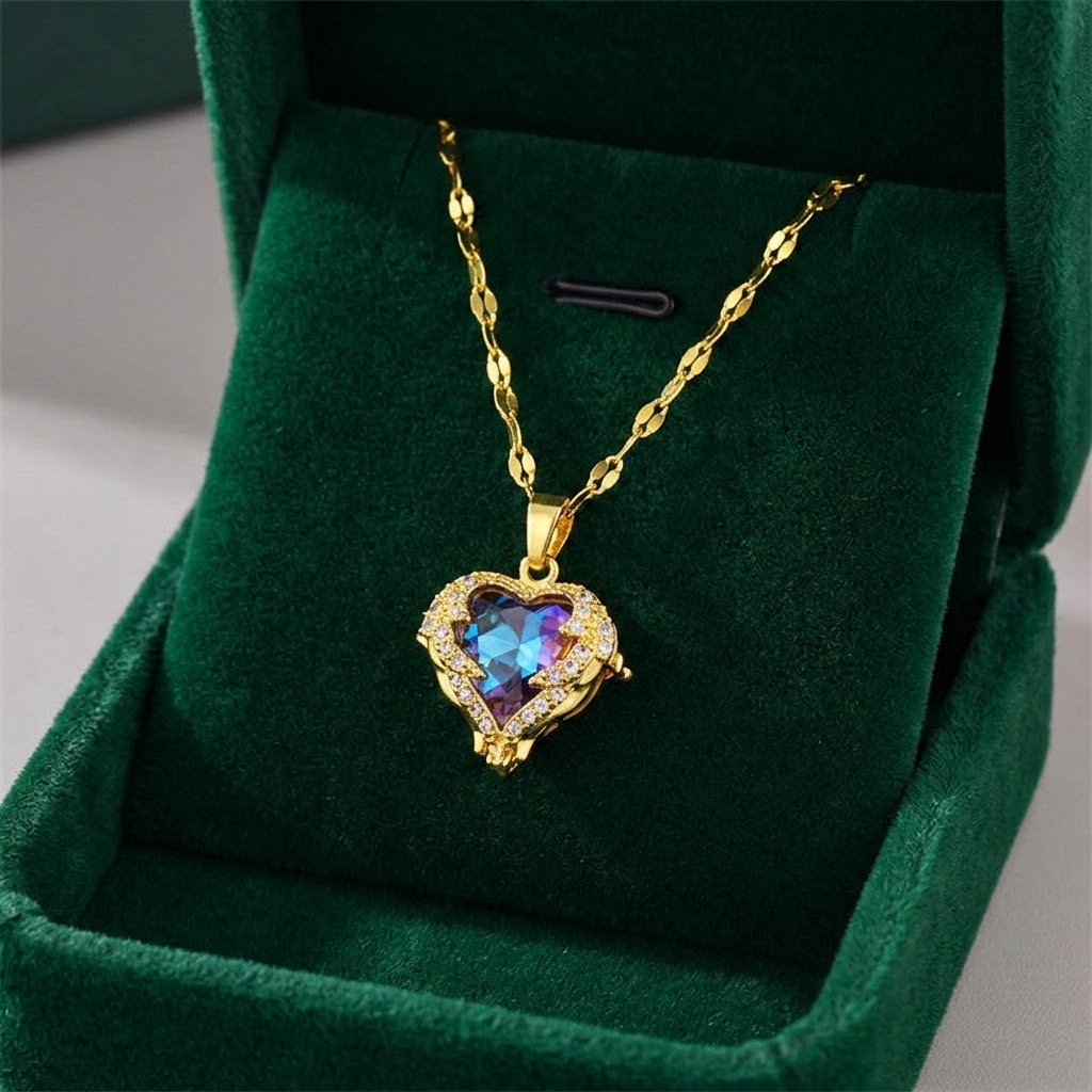 Gold heart pendant necklace with purple gemstone halo and sparkling side accents