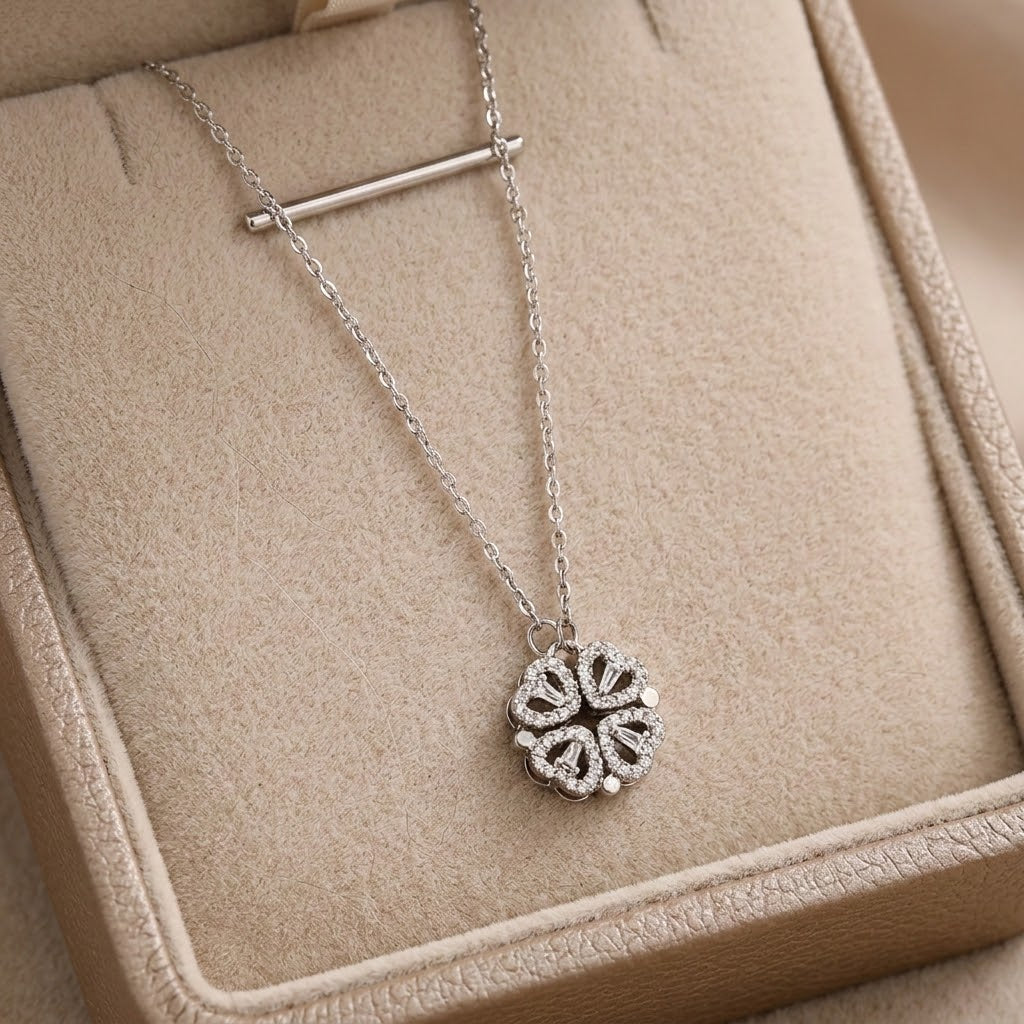 Silver-tone floral clover pendant necklace with faceted gemstone flower