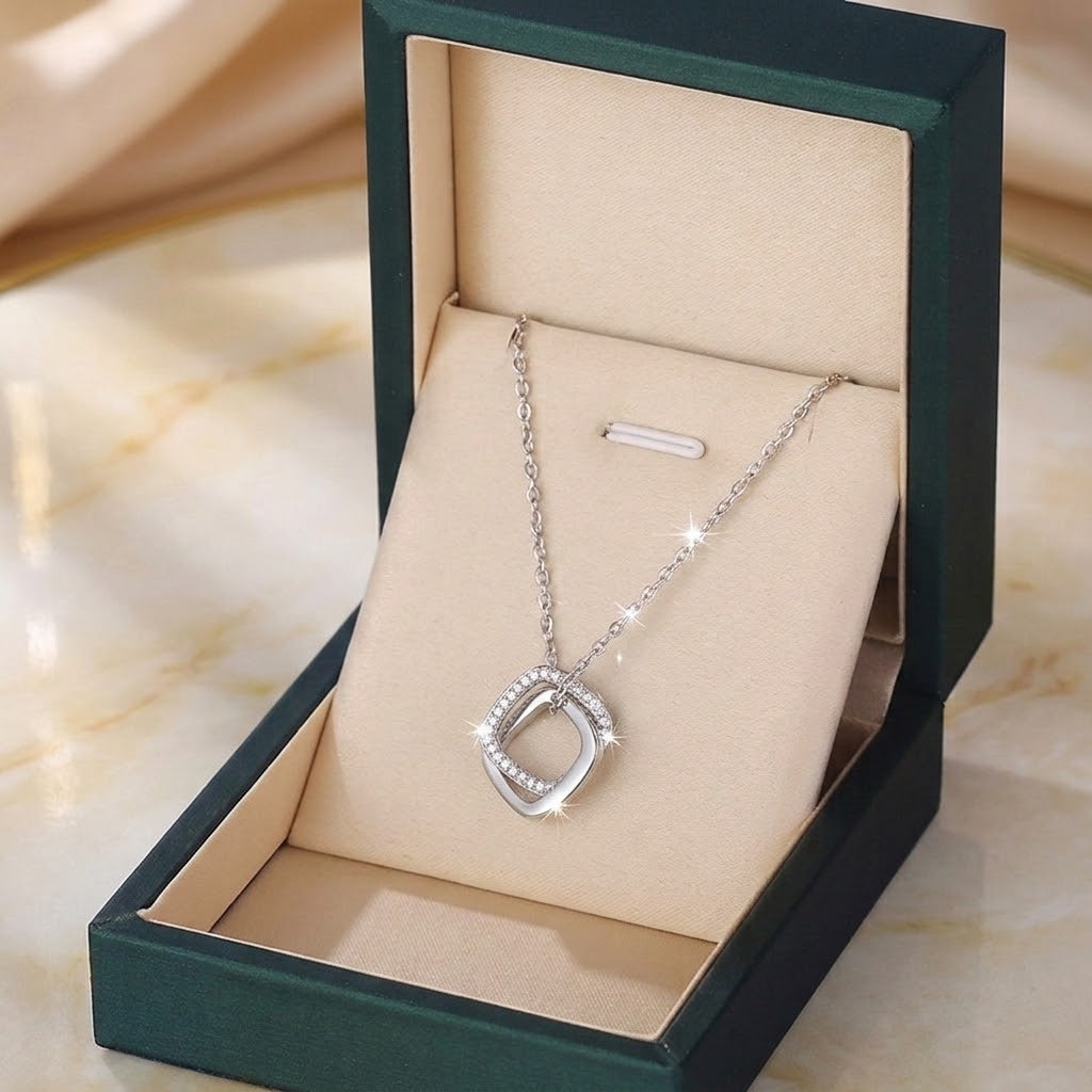 Double square charm necklace with silver chain in a presentation box
