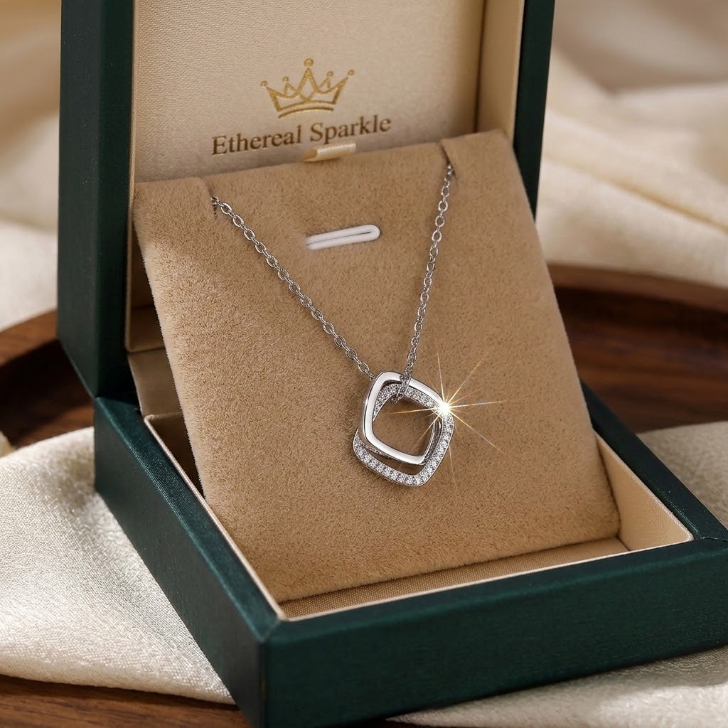 Silver-tone heart charm necklace with crystal-set square pendant
