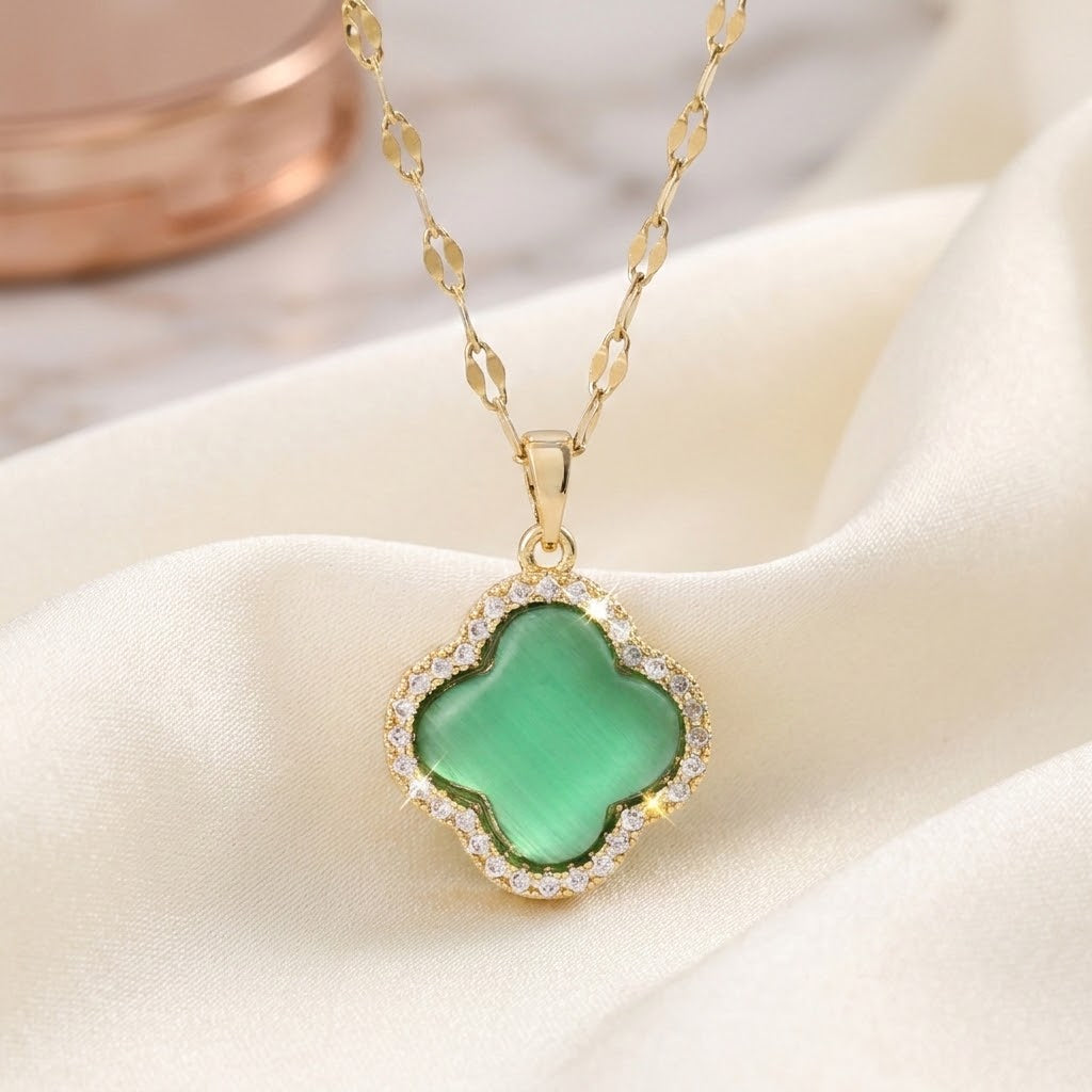 Flower garden pendant necklace with gold chain and green clover-shaped stone pendant
