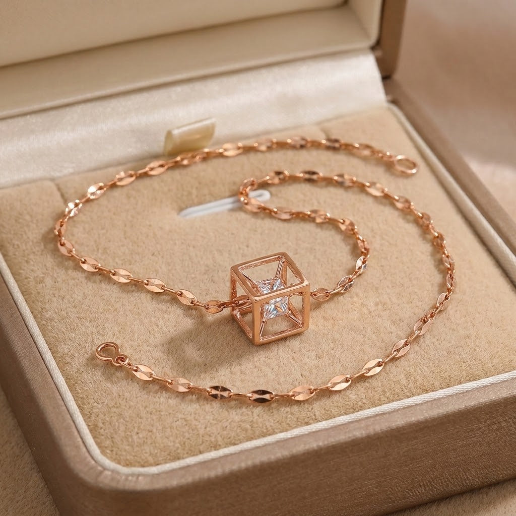 Rose gold square pendant necklace with heart-cut crystal centerpiece on chain