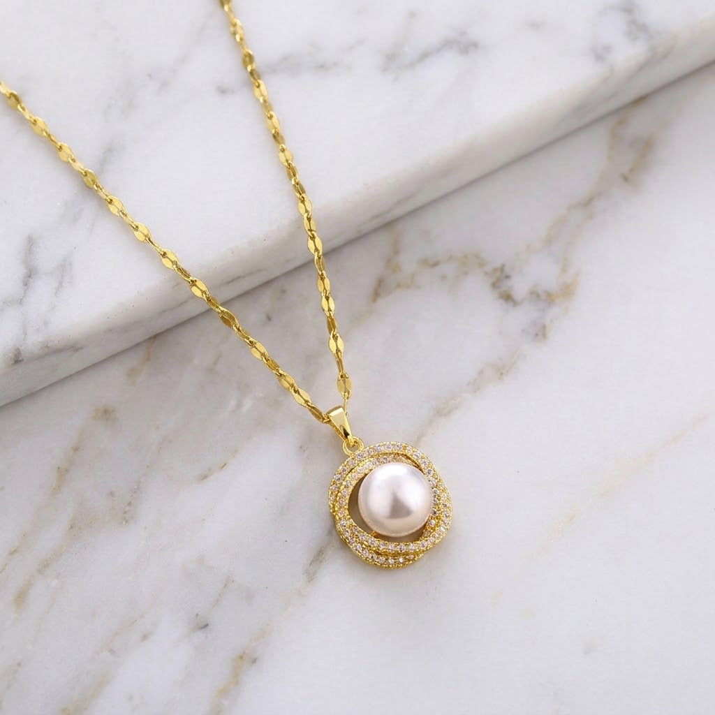 White bead charm pendant necklace with gold chain and round pearl-like pendant