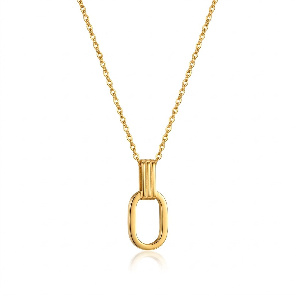 Gold O-shaped charm pendant necklace with vertical oval charm and linked chain
