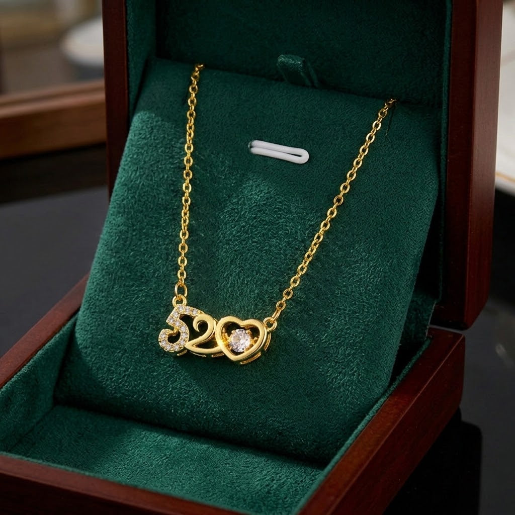 Gold-tone '520' heart pendant necklace with round crystal center