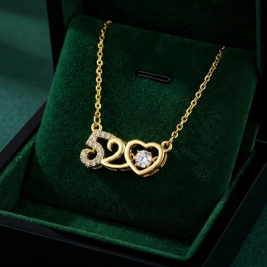 Gold 520 charm necklace with heart pendant and clear stones