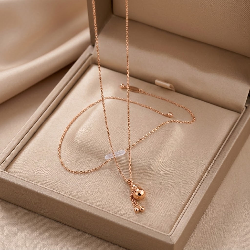 Rose gold gourd charm pendant necklace in open gift box with double chain