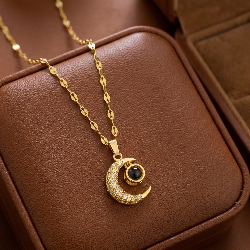 Gold moon charm pendant necklace, crescent pendant with glitter edge and dark center