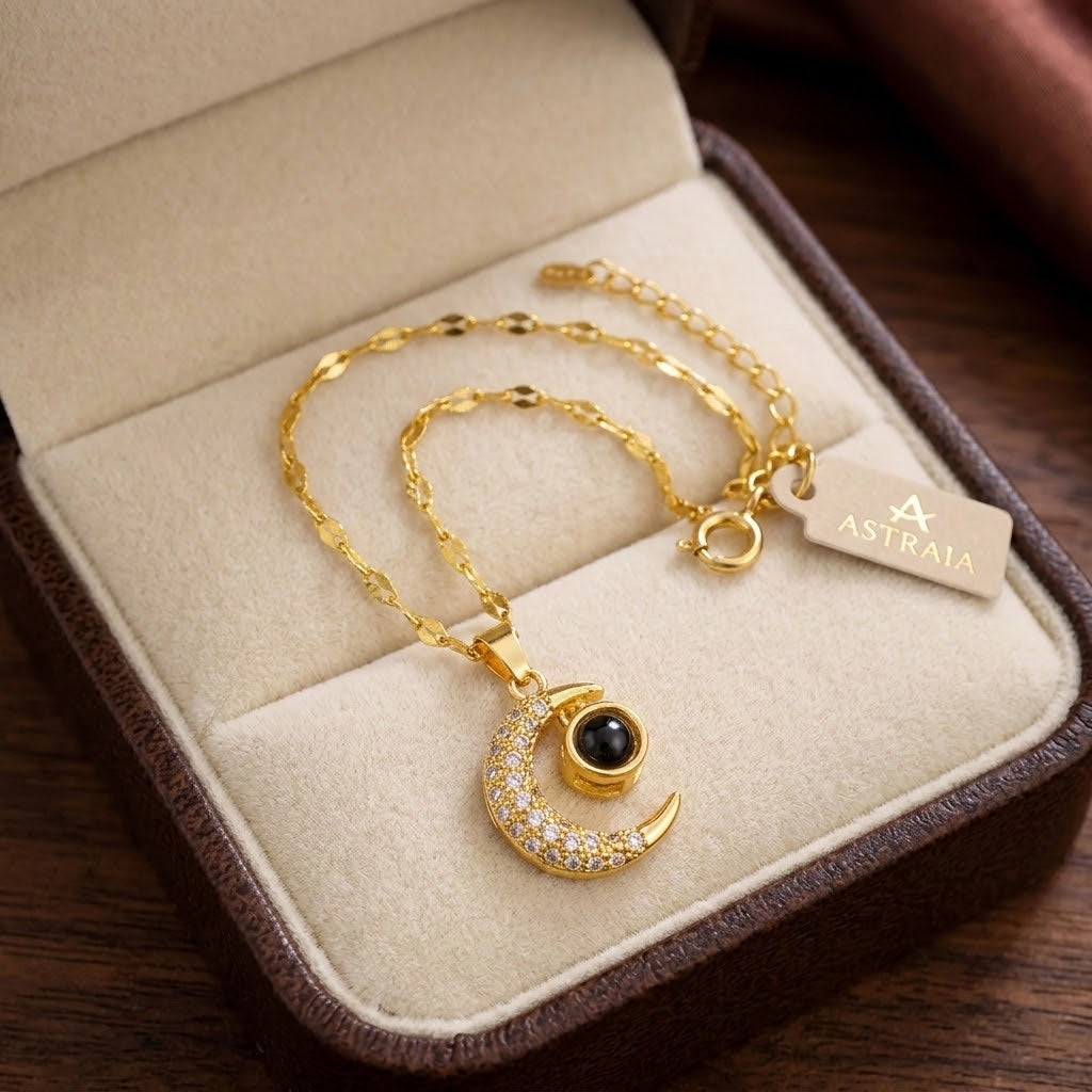 Gold crescent moon charm pendant necklace with chain and lobster clasp