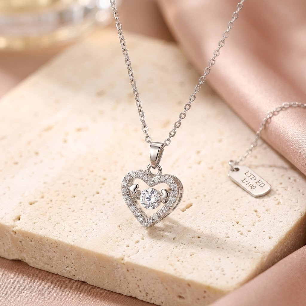 Silver mini heart necklace with glittery heart pendant on a delicate chain