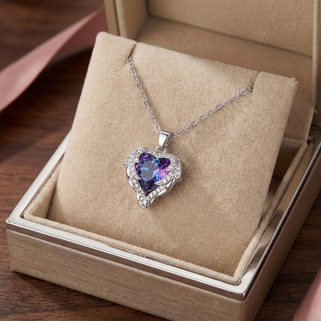 Silver heart halo pendant necklace with purple center gemstone and sparkling border